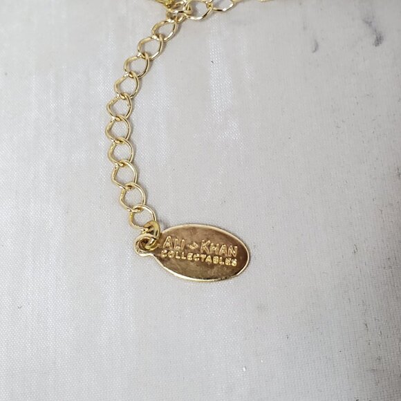 Ali Khan gold-toned multi-strand necklace featuring six layers - Picture 9 of 9